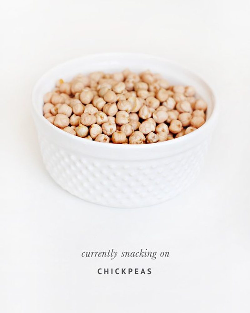 White bowl filled with chickpeas for healthy dog treat recipes.